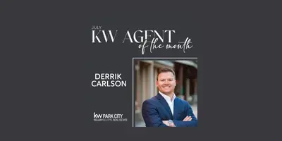Derrik Carlson in a navy suit beside text naming him July KW Agent of the Month for KW Park City Keller Williams Real Estate.