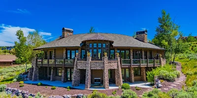 Park City luxury home listed by Derrik Carlson photographed at dusk for marketing
