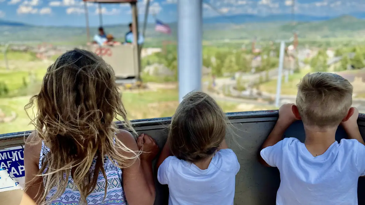 Summer gondola ride with mountain valley views at Canyons Village, Park City Utah