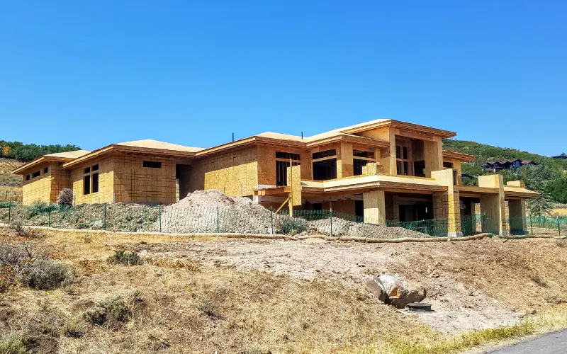 Vacant lot for custom home construction in Glenwild, Park City, Utah, with mountain views and paved road access