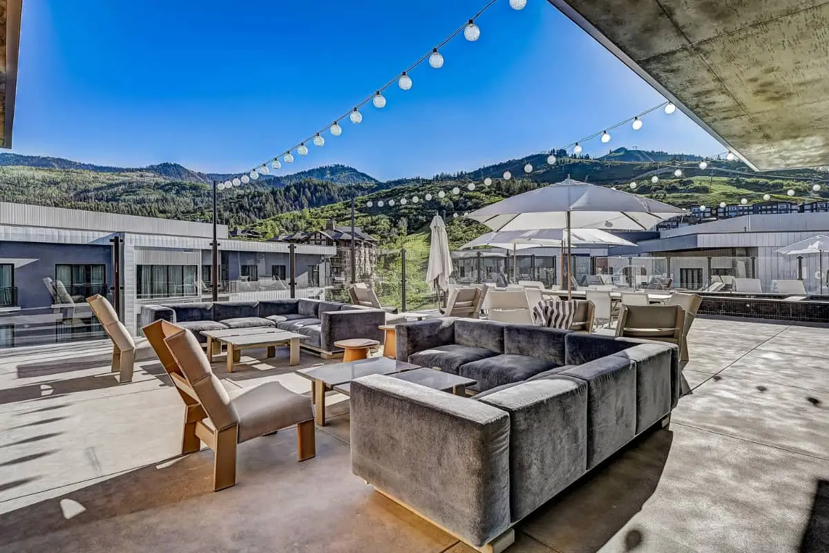 Amenities inside a Park City condo building including pool and lounge areas