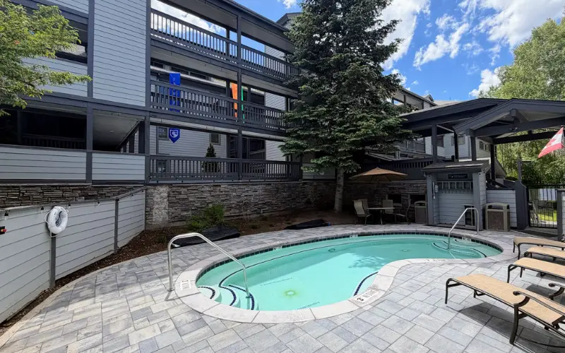Heated outdoor pool at Snow Flower condominiums at the base of Park City Mountain Resort