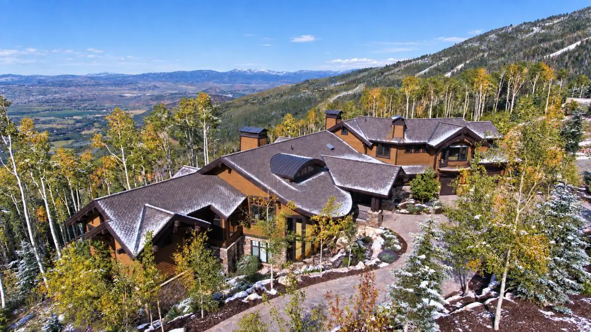 Ski-in/ski-out home on a large wooded lot at The Colony at White Pine Canyon, Park City, Utah, with a Park City Mountain run beside it